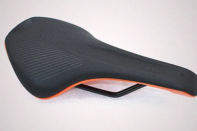 Bicycle Saddle Cube Natural Fit Nuance Black Lite Orange Glossy Saddle